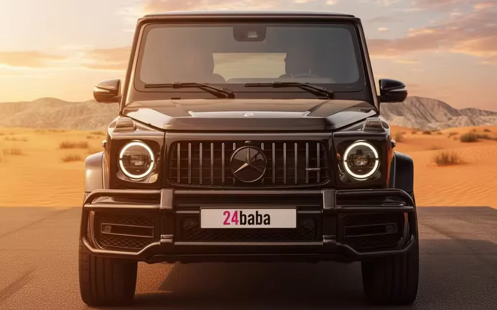 Mercedes G63 2023 Black front view with headlights – rental in Dubai