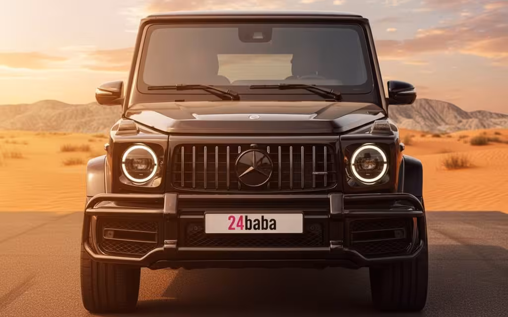 Mercedes G63 2023 Black front view with headlights – rental in Dubai