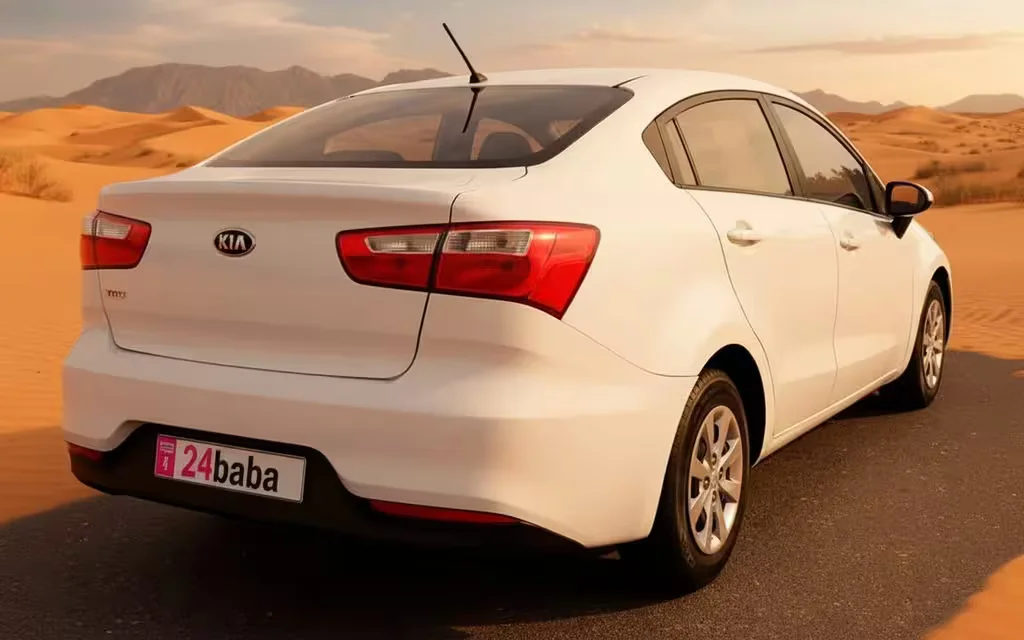 Kia Rio 2025 White rear view showing taillights – rental in Dubai
