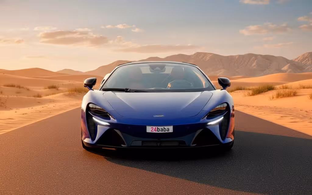 Mclaren Artura 2025 Blue front view with headlights – rental in Dubai