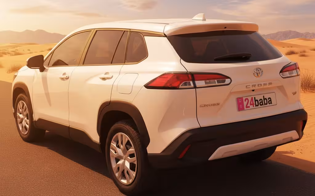 Toyota CorollaCross 2023 White rear view showing taillights – rental in Dubai