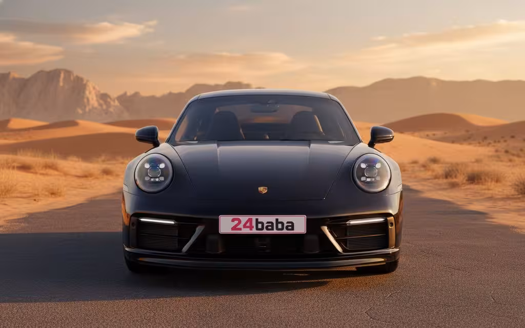 Porsche 911 2024 Black front view with headlights – rental in Dubai