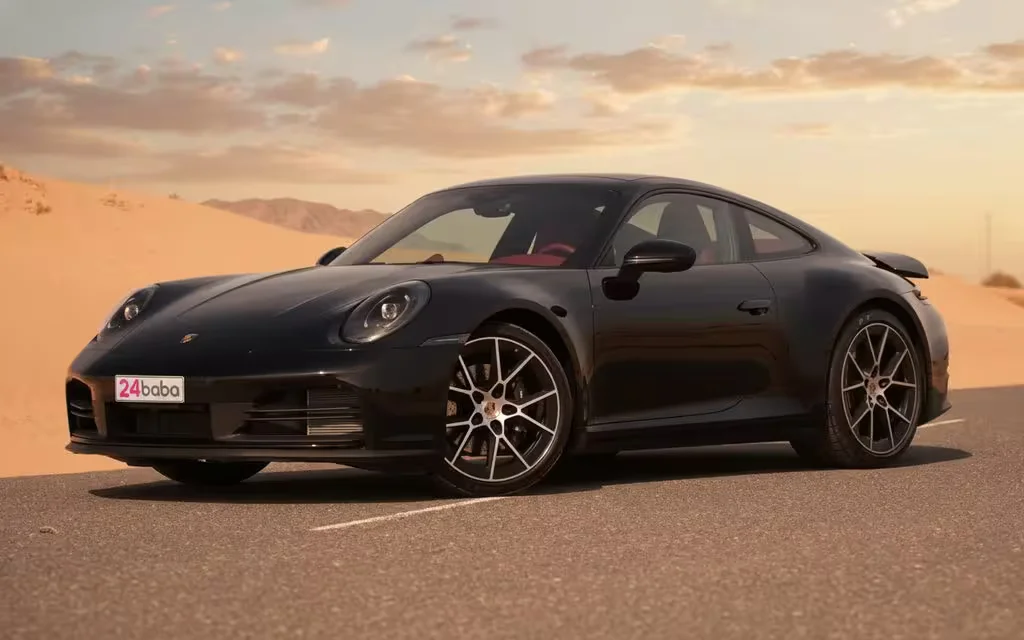 Porsche 911 2025 Black front view with headlights – rental in Dubai