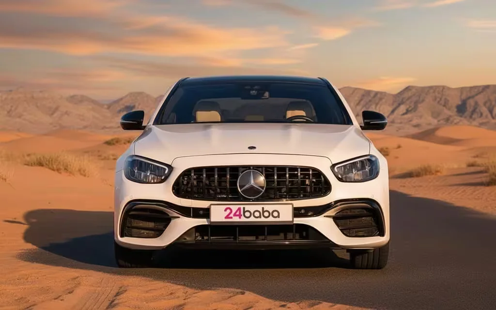 Mercedes E350 2023 White front view with headlights – rental in Dubai