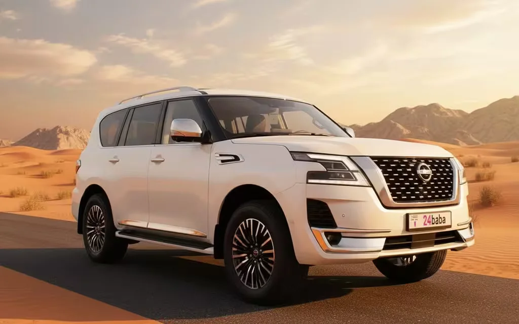 Nissan Patrol 2022 White front view with headlights – rental in Dubai