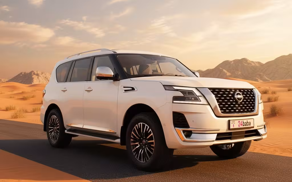 Nissan Patrol 2022 White front view with headlights – rental in Dubai