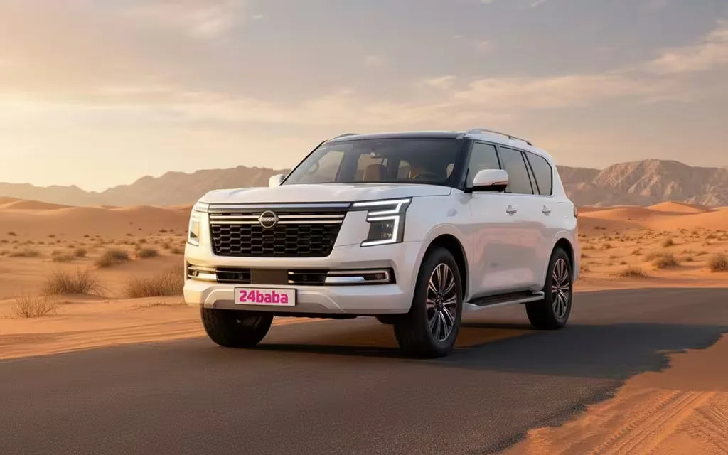 Nissan Patrol 2025 White front view with headlights – rental in Dubai