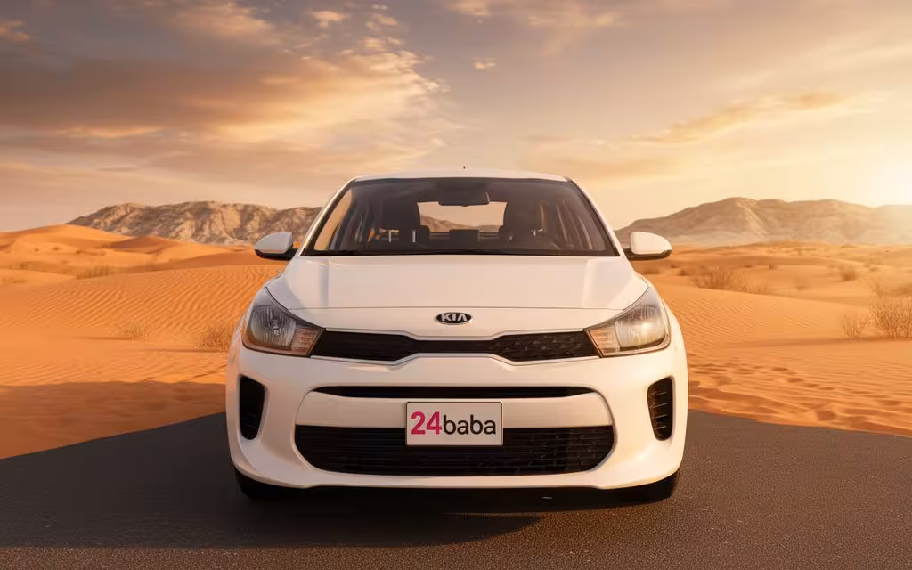 Kia Rio 2021 White front view with headlights – rental in Dubai