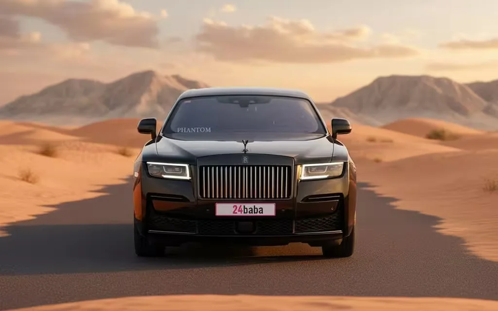 RollsRoyce Ghost 2022 Black front view with headlights – rental in Dubai