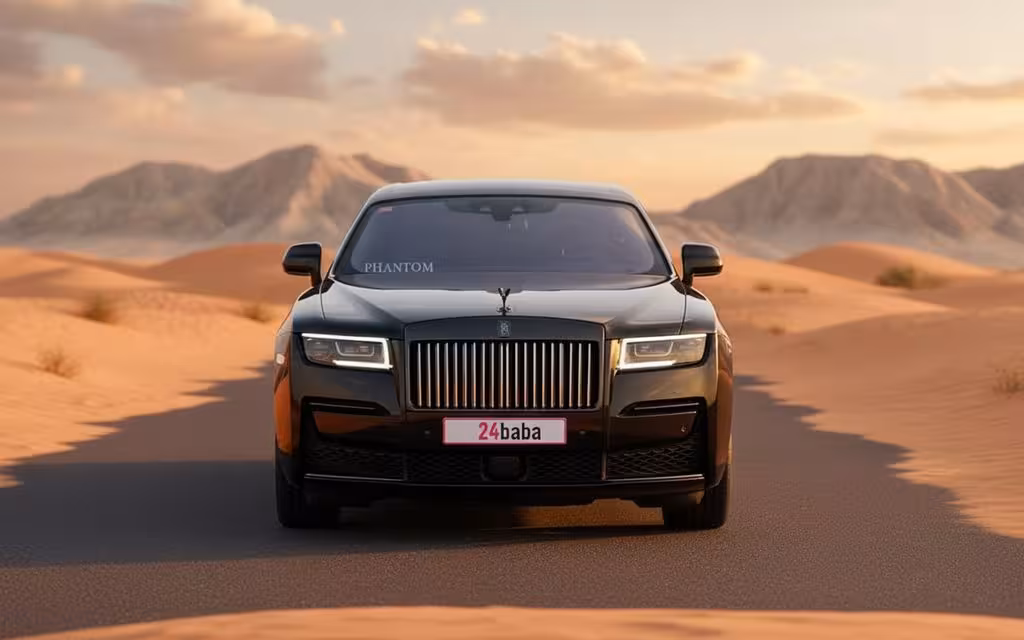 RollsRoyce Ghost 2022 Black front view with headlights – rental in Dubai