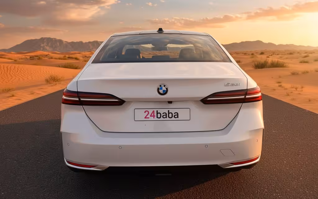 Bmw 520 2024 White rear view showing taillights – rental in Dubai