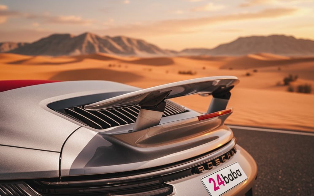 Porsche 911 2025 Silver rear view showing taillights