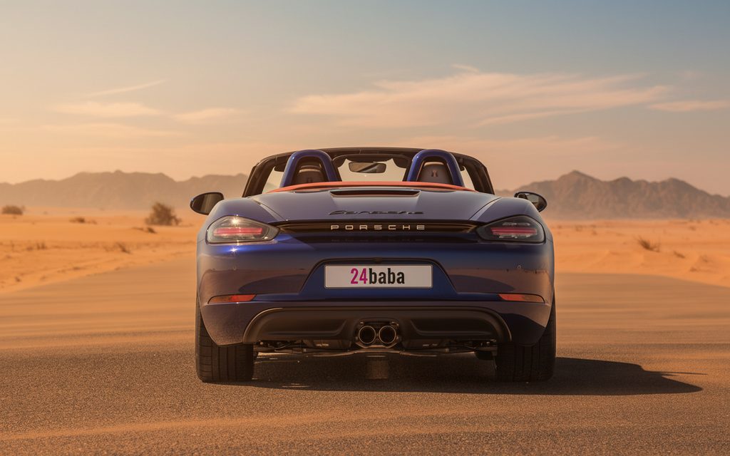 Porsche Boxster 2024 Black rear view showing taillights