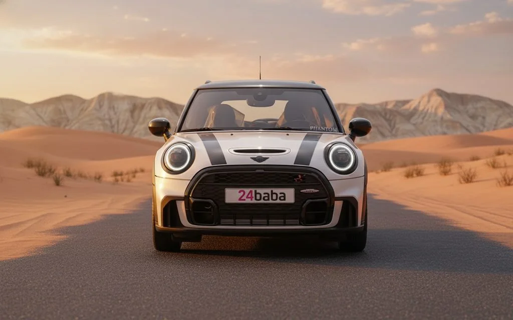 Mini Cooper 2023 White front view with headlights – rental in Dubai