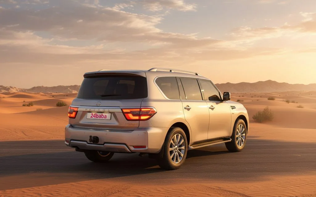 Nissan Patrol 2023 Silver rear view showing taillights – rental in Dubai