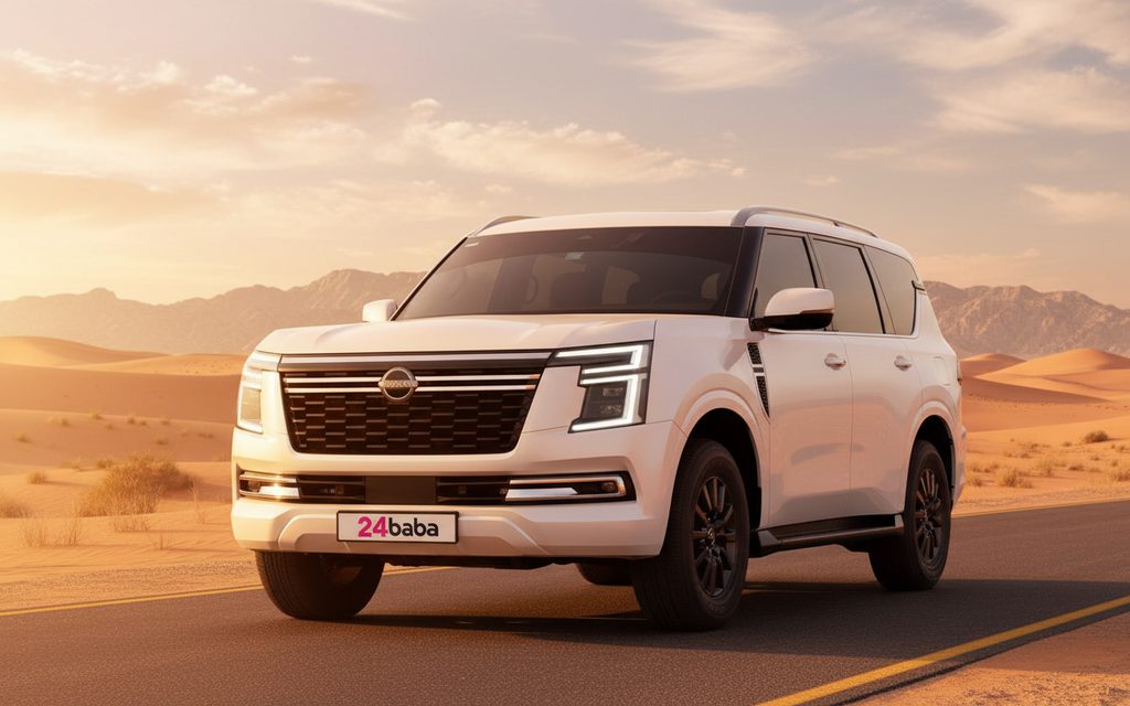 Nissan Patrol 2025 White front view with headlights – rental in Dubai
