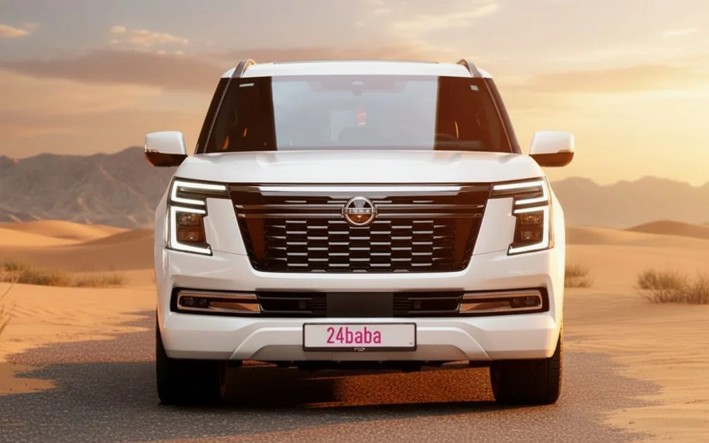 Nissan Patrol 2025 White front view with headlights – rental in Dubai
