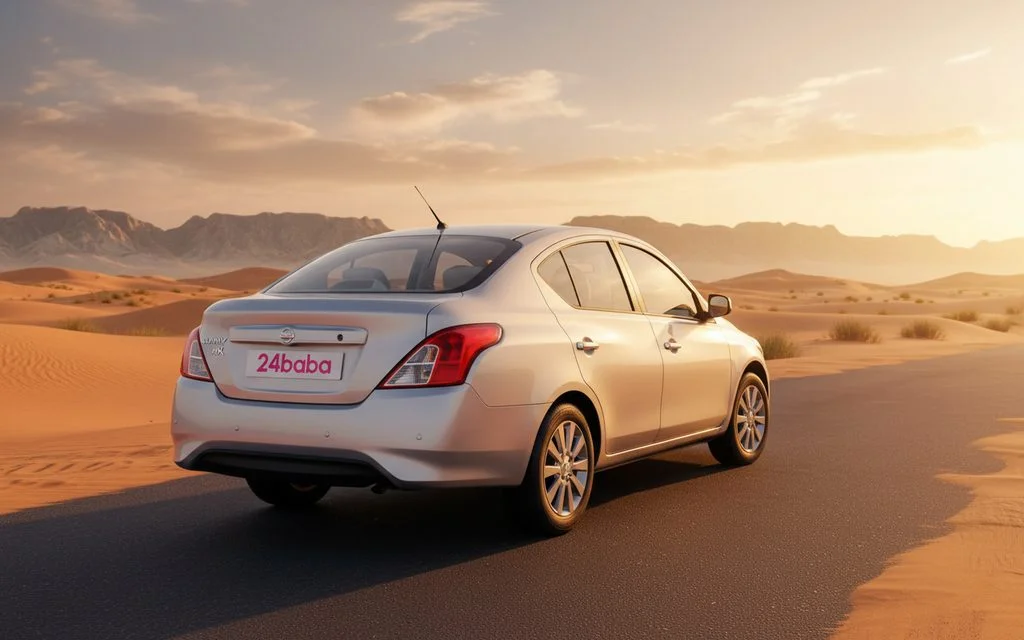 Nissan Sunny 2022 Silver rear view showing taillights – rental in Dubai
