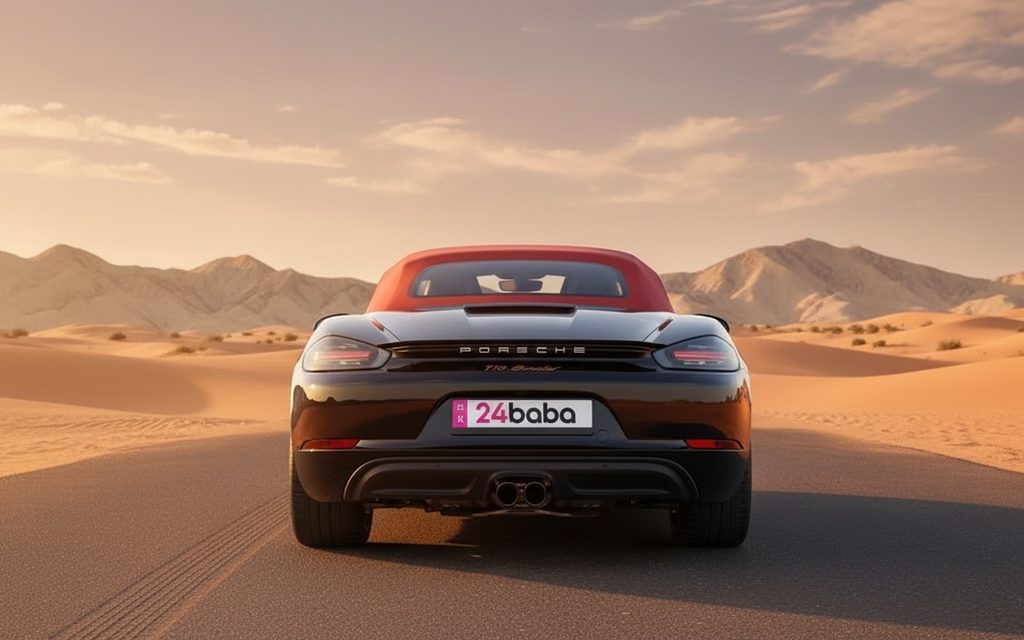 Porsche Boxster 2024 Black rear view showing taillights