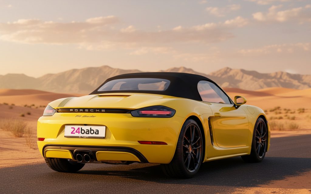 Porsche Boxster 2024 Yellow rear view showing taillights