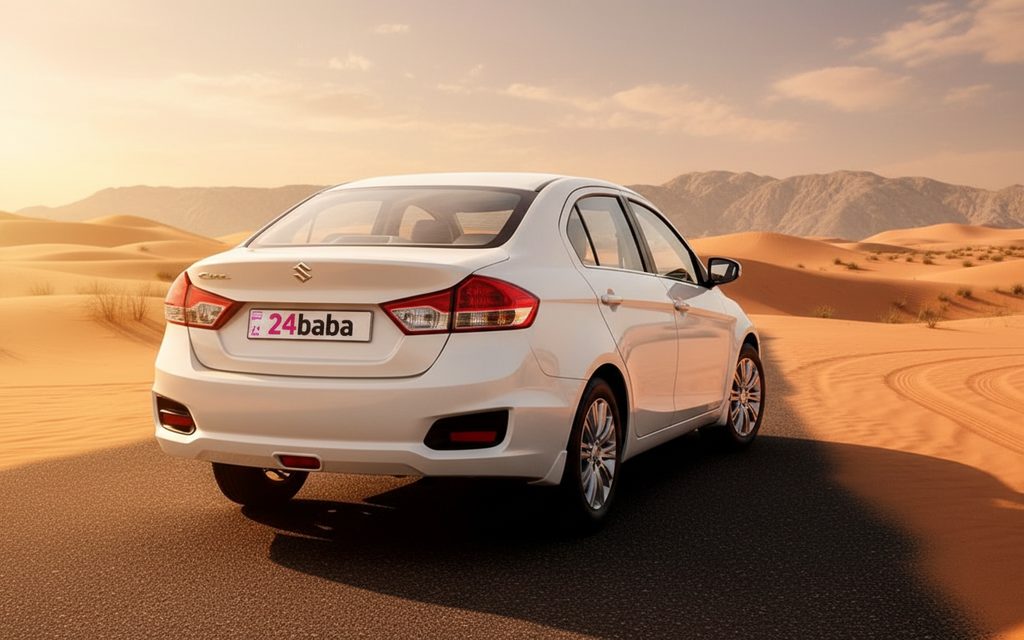 Suzuki Ciaz 2023 White rear view showing taillights – rental in Dubai