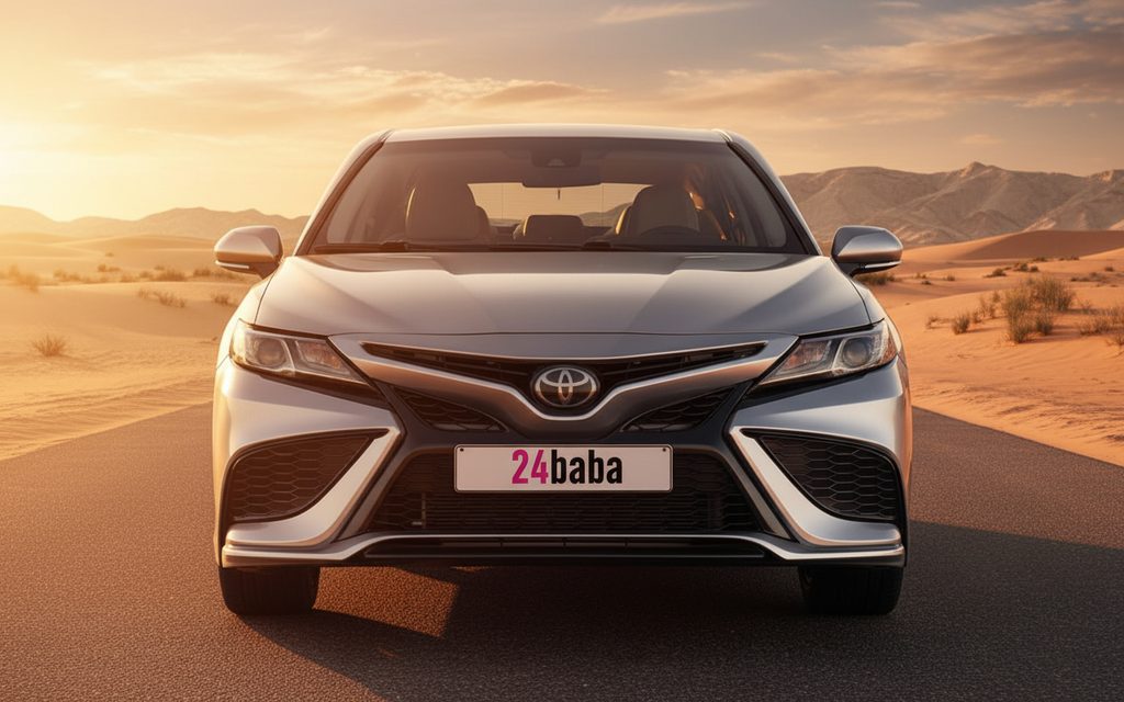 Toyota Camry 2022 Silver front view with headlights – rental in Dubai