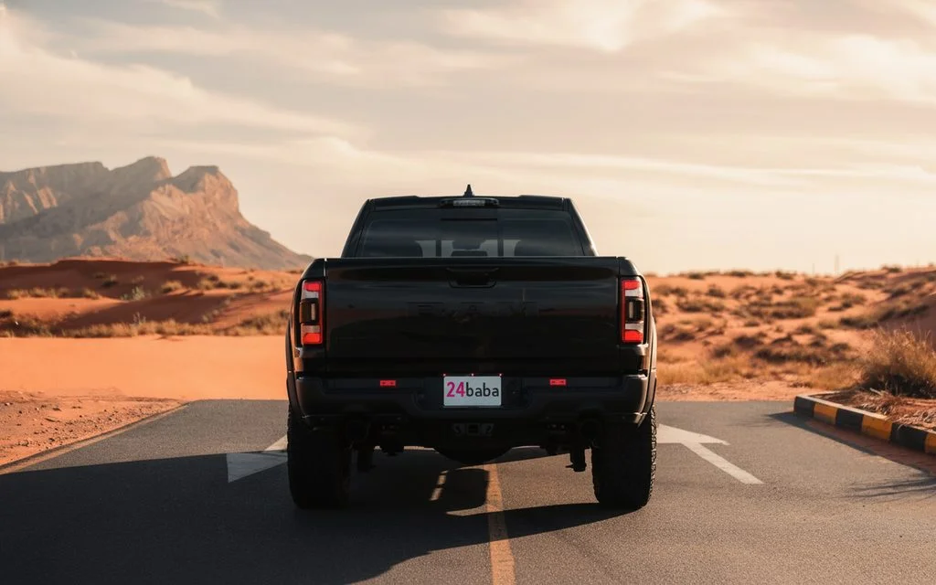 Dodge Ram 2022 Black rear view showing taillights – rental in Dubai
