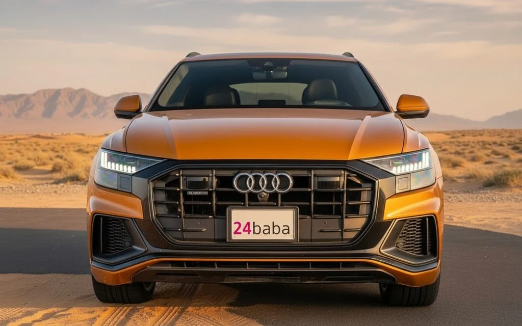 Audi Q8 2021 Gold front view with headlights – rental in Dubai