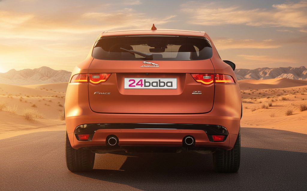 Jaguar E Pace 2020 Orange rear view showing taillights – rental in Dubai