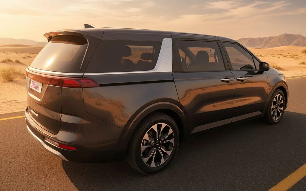 Kia Carnival 2023 Dark Gray side profile – rental in Dubai
