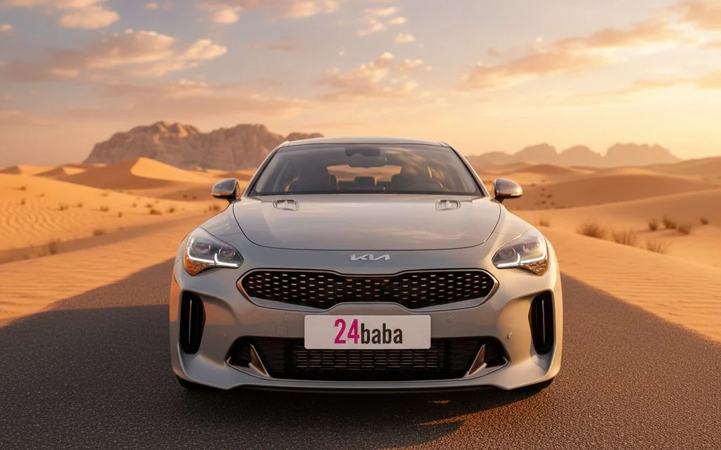 Kia Stinger 2023 Grey front view with headlights – rental in Dubai