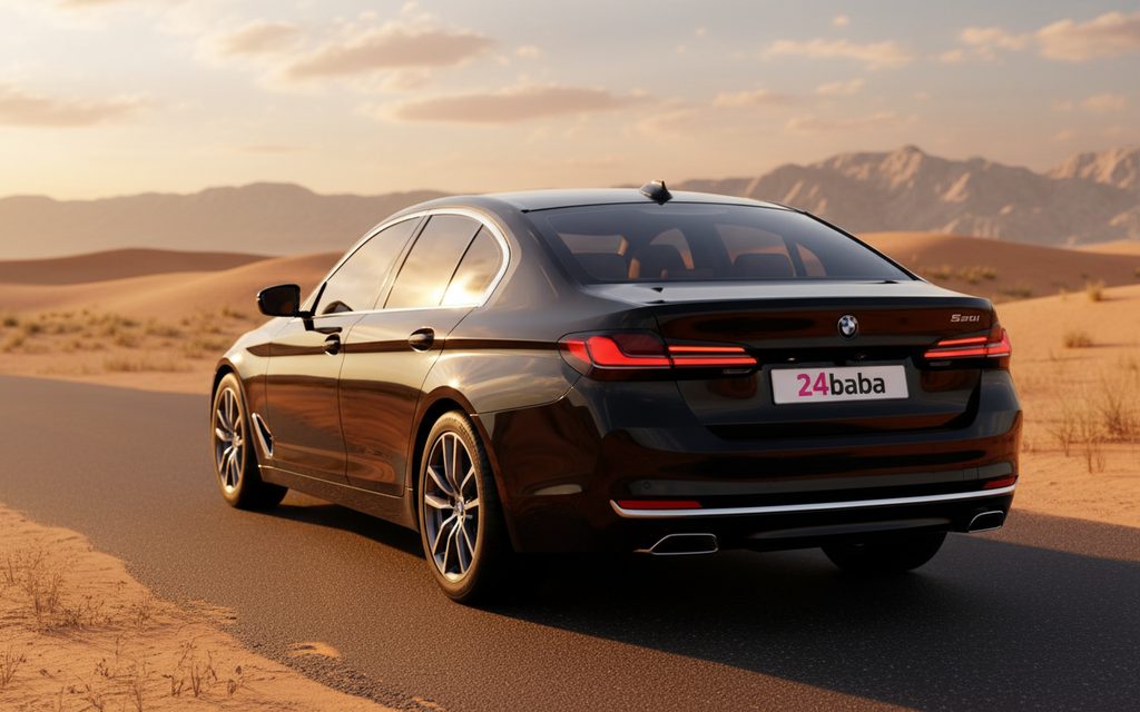 Bmw 520 2023 Black rear view showing taillights – rental in Dubai