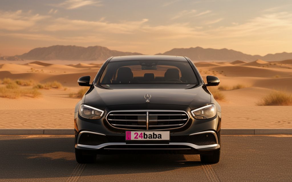 Mercedes E350 2023 Black front view with headlights – rental in Dubai