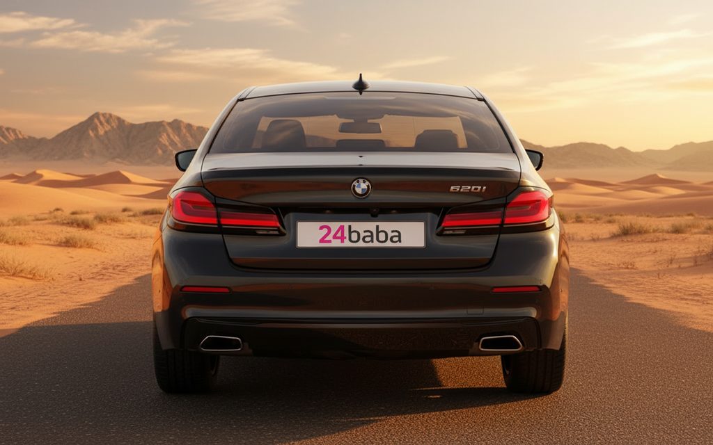 Bmw 520 2023 Dark Gray rear view showing taillights – rental in Dubai