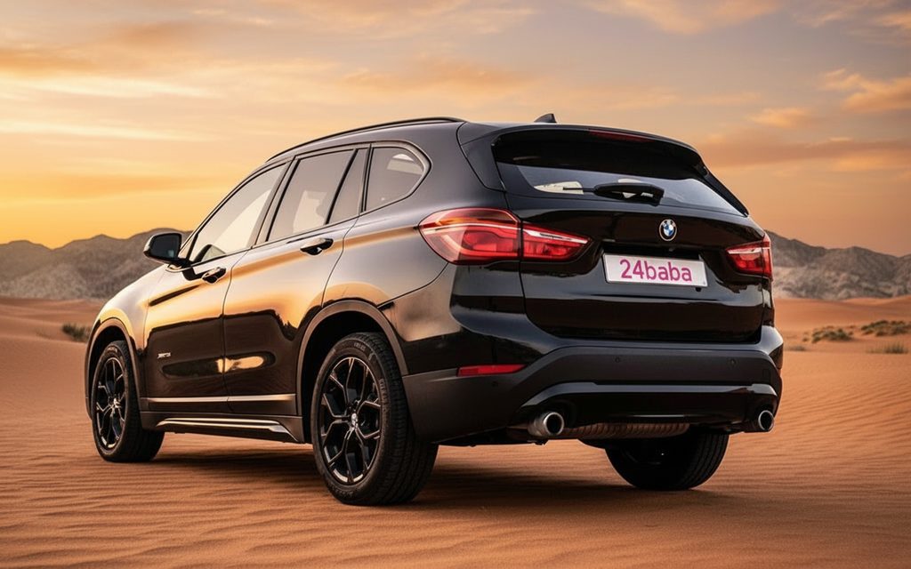 Bmw X1 2021 Black rear view showing taillights – rental in Dubai