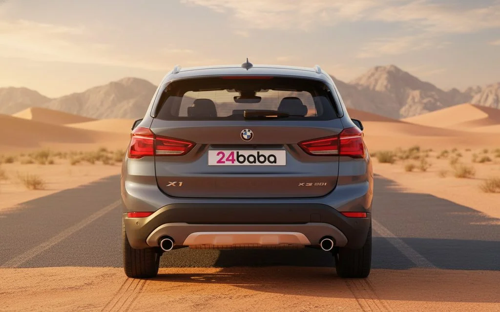 Bmw X1 2021 Grey rear view showing taillights – rental in Dubai