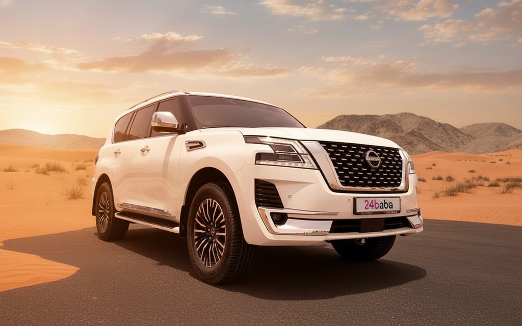 Nissan Patrol 2022 White front view with headlights – rental in Dubai