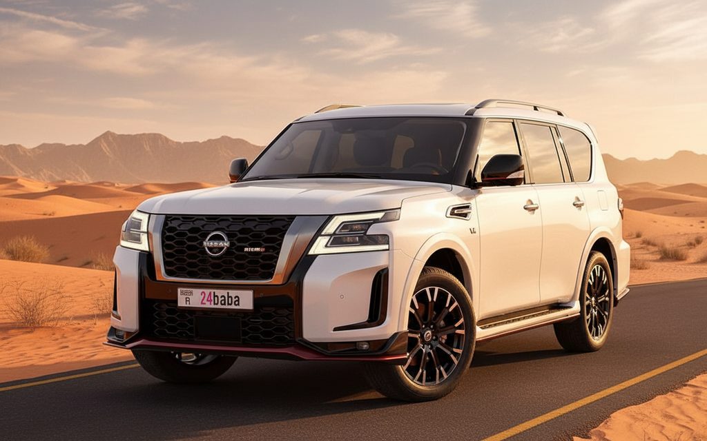 Nissan Patrol 2023 White front view with headlights – rental in Dubai