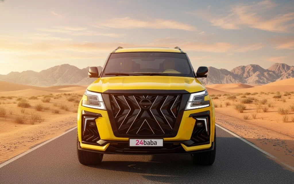 Nissan Patrol 2023 Yellow front view with headlights – rental in Dubai