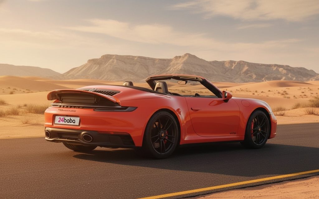 Porsche 911 2022 Orange rear view showing taillights – rental in Dubai