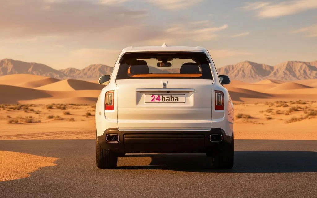 RollsRoyce Cullinan 2022 White rear view showing taillights – rental in Dubai
