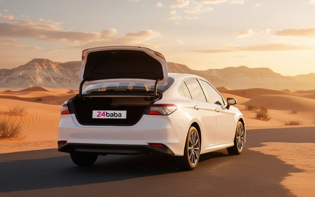 Toyota Camry 2024 White rear view showing taillights – rental in Dubai