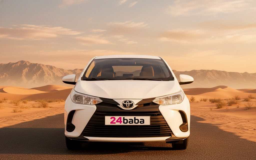 Toyota Yaris 2023 White front view with headlights – rental in Dubai
