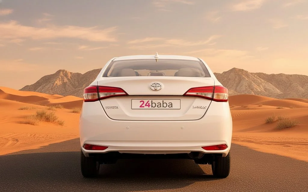 Toyota Yaris 2023 White rear view showing taillights – rental in Dubai