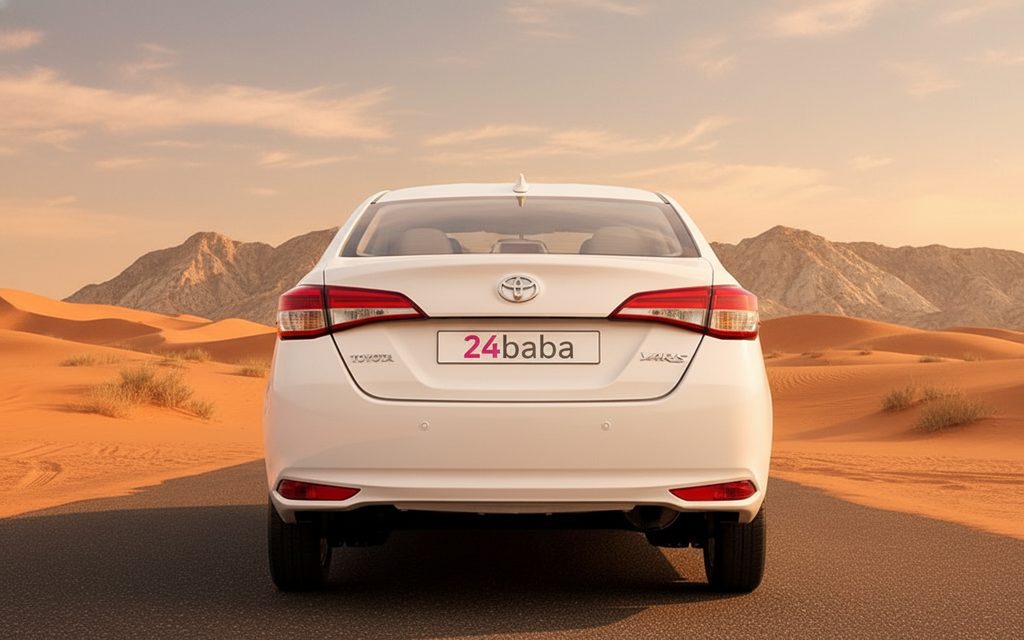 Toyota Yaris 2023 White rear view showing taillights – rental in Dubai