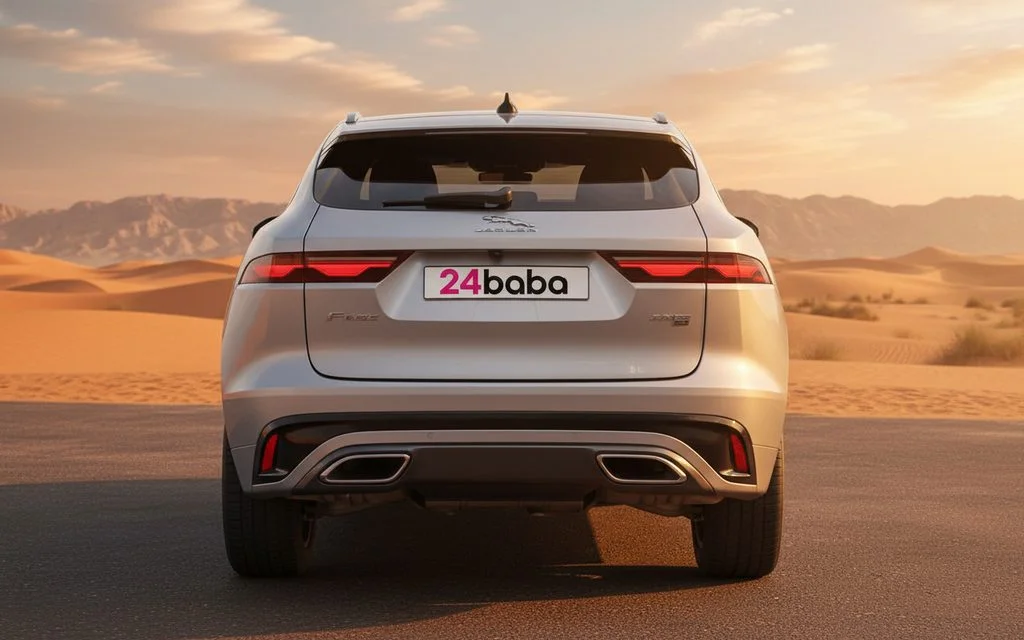 Jaguar E Pace 2021 Silver rear view showing taillights – rental in Dubai