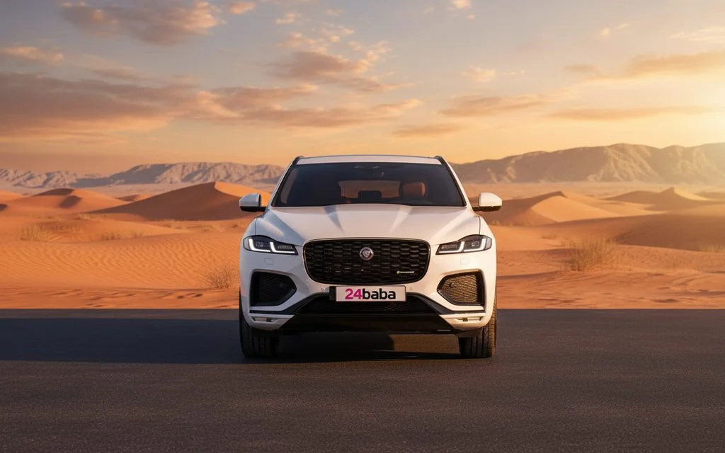 Jaguar F Pace 2024 White front view with headlights – rental in Dubai