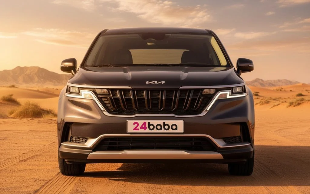 Kia Carnival 2024 Dark Gray front view with headlights – rental in Dubai