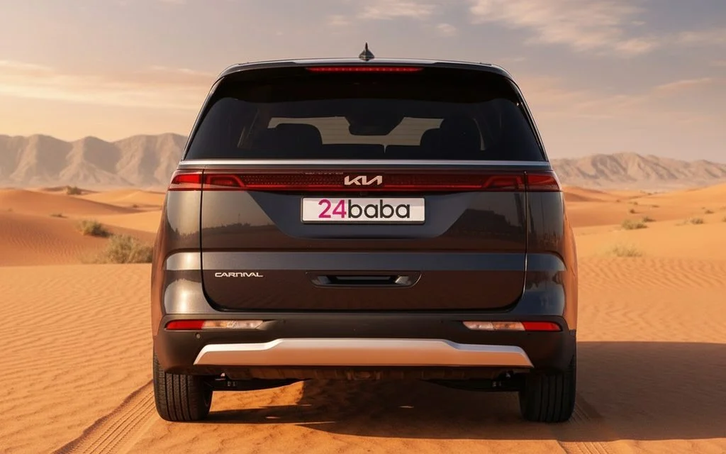 Kia Carnival 2024 Dark Gray rear view showing taillights – rental in Dubai