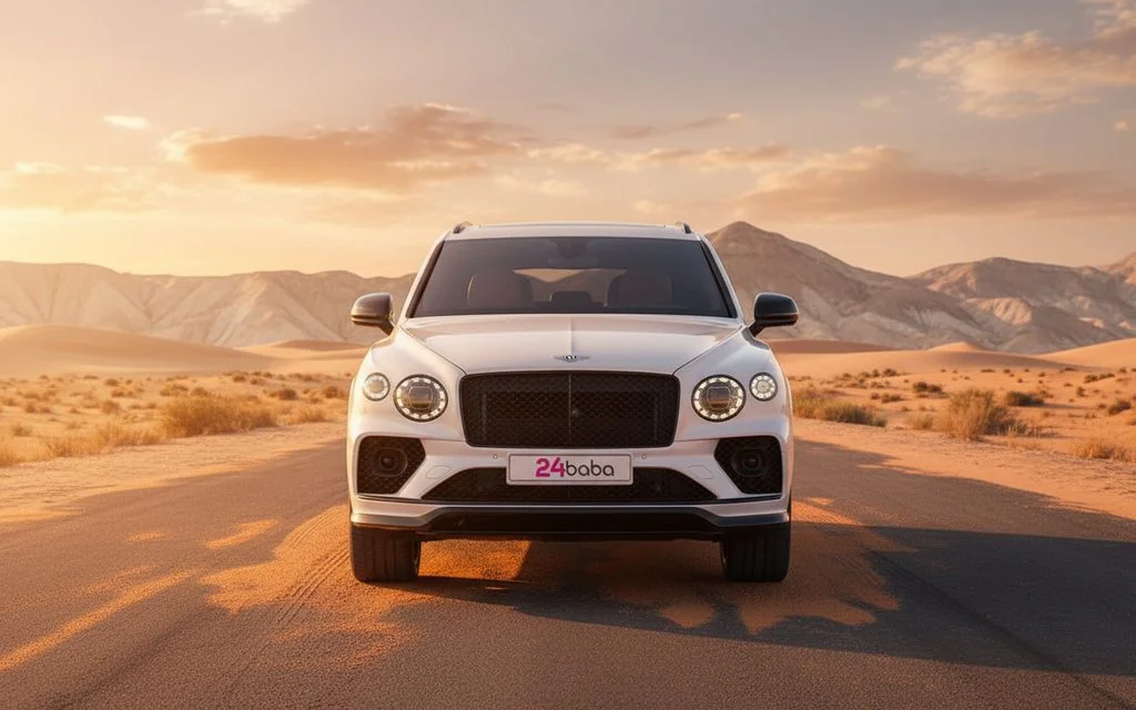 Bentley Bentayga 2023 White front view with headlights – rental in Dubai